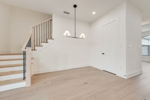 3206 Bexar St, Rockwall, TX 75032 - stairs with wood finished floors and recessed lighting