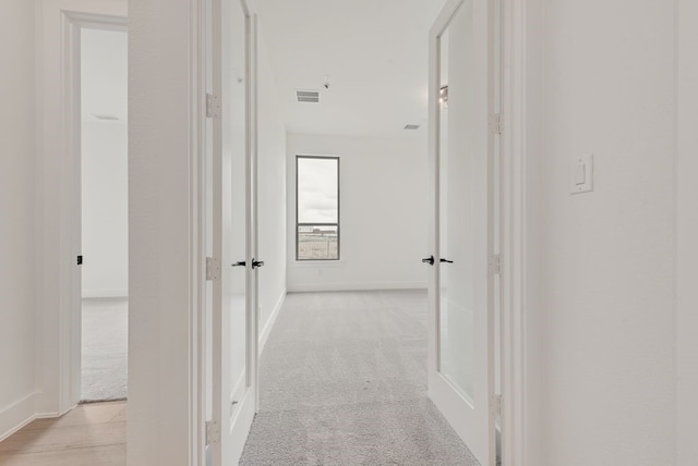 3206 Bexar St, Rockwall, TX 75032 - hallway with light colored carpet