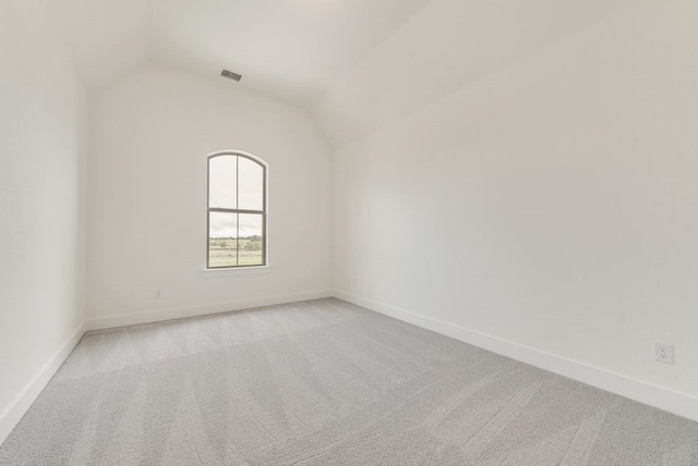3206 Bexar St, Rockwall, TX 75032 - empty room featuring light colored carpet and lofted ceiling