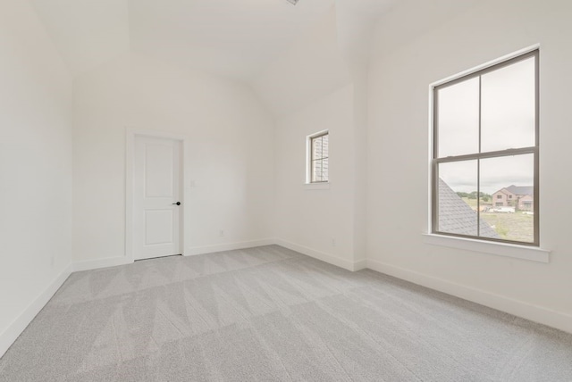 3206 Bexar St, Rockwall, TX 75032 - unfurnished room with light carpet and lofted ceiling