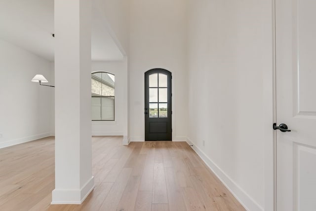 3206 Bexar St, Rockwall, TX 75032 - entrance foyer with light wood-style flooring and a high ceiling