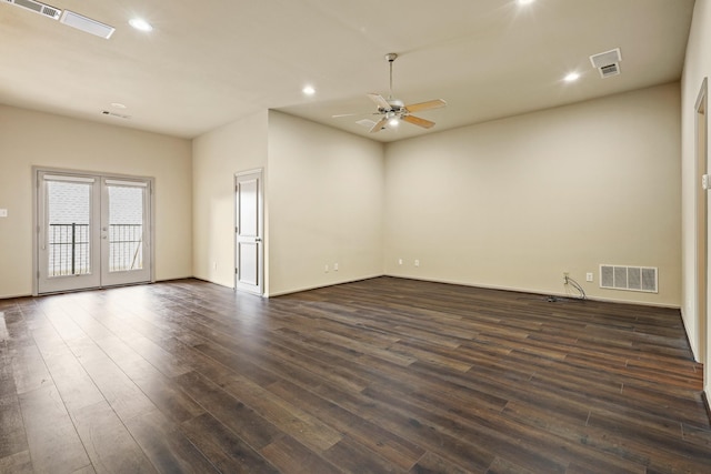 spare room with recessed lighting, dark wood-style flooring, visible vents, and french doors