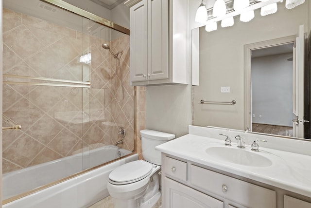 full bathroom with visible vents, combined bath / shower with glass door, vanity, and toilet