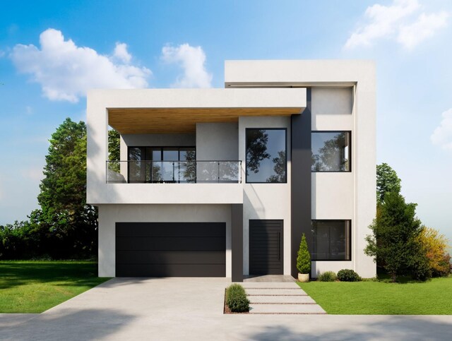 contemporary house featuring a front lawn, concrete driveway, an attached garage, and stucco siding