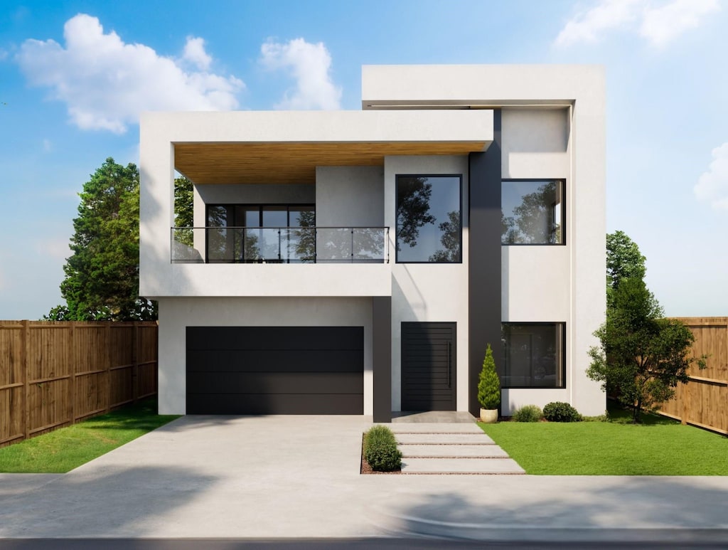 contemporary house featuring concrete driveway, fence, an attached garage, and stucco siding