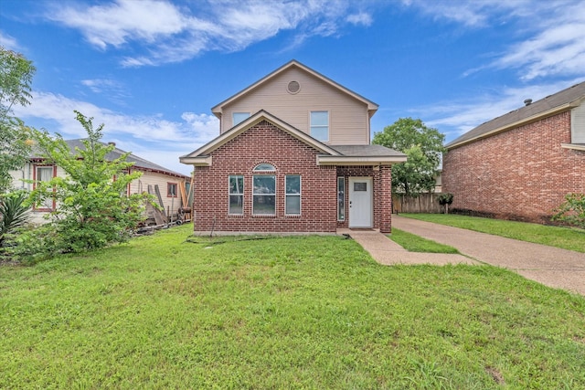 1520 Bagby Ave, Waco, TX 76706 - traditional home featuring a front yard and brick siding