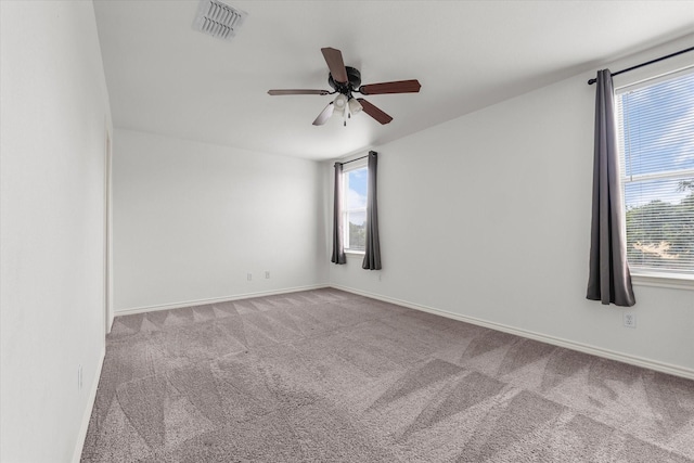 1520 Bagby Ave, Waco, TX 76706 - unfurnished room featuring carpet floors, ceiling fan, and baseboards