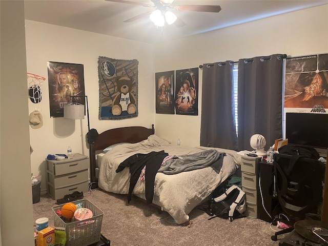 bedroom featuring ceiling fan and carpet flooring