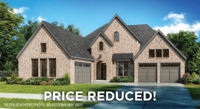 3126 Fisher Rd, Rockwall, TX 75032 - view of front of home with brick siding, driveway, a front yard, and roof with shingles