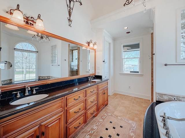 full bathroom with ornamental molding and a tub with jets