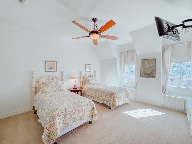 unfurnished living room with ceiling fan, baseboards, crown molding, and carpet flooring