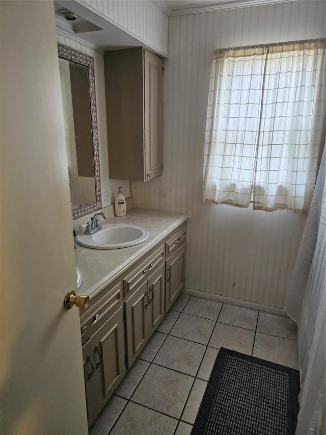 bathroom with tile patterned flooring and vanity