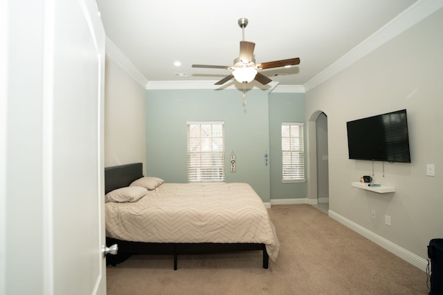 bedroom with visible vents, baseboards, crown molding, and light colored carpet