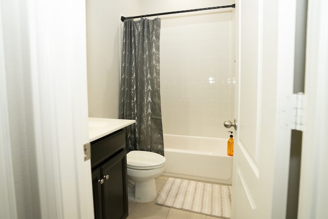 full bathroom featuring toilet, shower / bathtub combination with curtain, vanity, and tile patterned floors