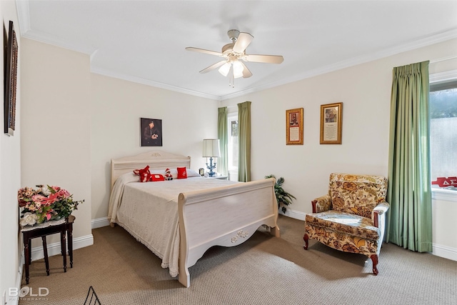 bedroom with carpet flooring, a ceiling fan, baseboards, and ornamental molding