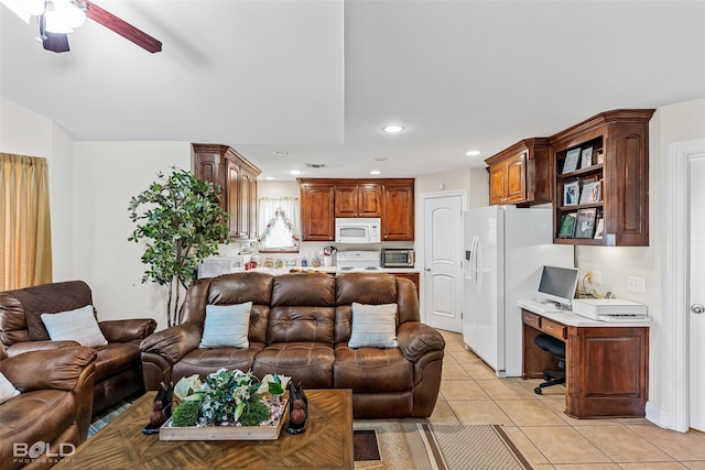 living room with light tile patterned floors, recessed lighting, built in study area, and ceiling fan