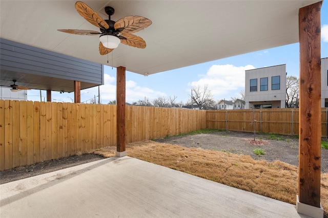 view of patio / terrace with a fenced backyard and ceiling fan