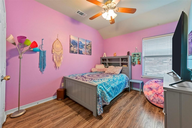 bedroom with dark wood-style flooring, lofted ceiling, visible vents, ceiling fan, and baseboards