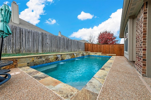 view of pool featuring a fenced in pool and a fenced backyard