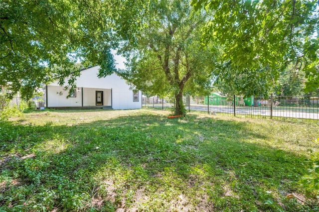 view of yard featuring fence