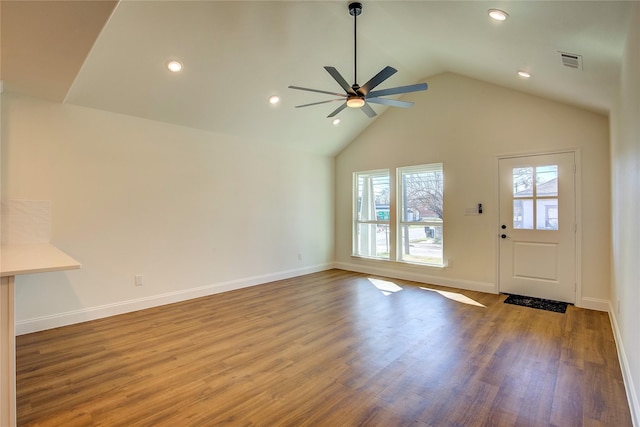 unfurnished living room with visible vents, baseboards, and wood finished floors