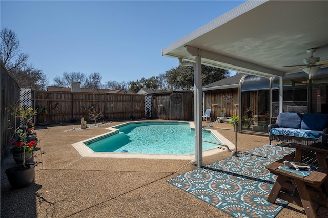 view of swimming pool featuring a patio and a fenced backyard