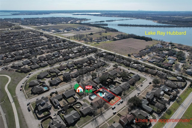 aerial view featuring a water view and a residential view