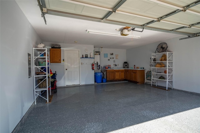 garage featuring a garage door opener