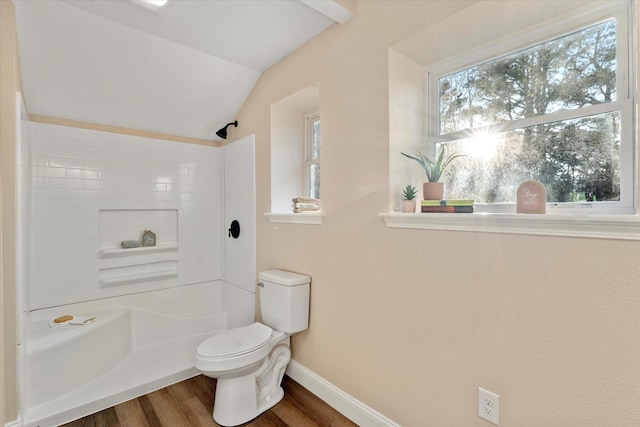 full bath with lofted ceiling, toilet, wood finished floors, baseboards, and a shower