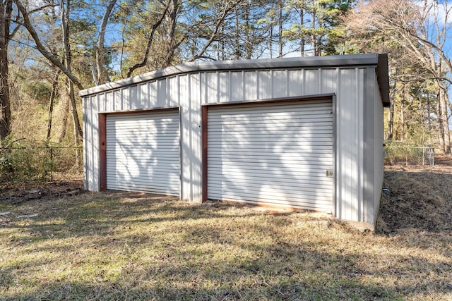 detached garage with fence