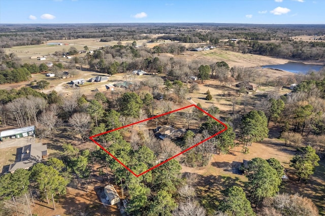 aerial view with a rural view and a water view