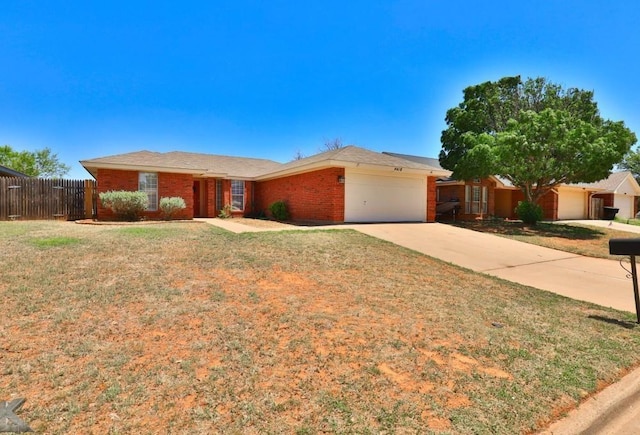 ranch-style house with brick siding, an attached garage, fence, and a front yard