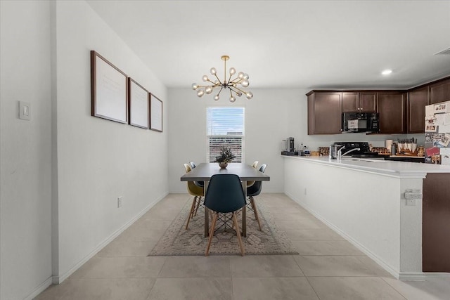 dining area with visible vents, a notable chandelier, baseboards, and light tile patterned flooring