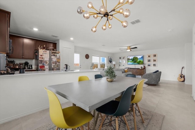 dining room with light tile patterned floors, visible vents, a ceiling fan, and recessed lighting