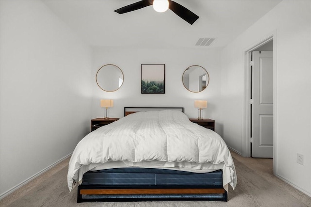 bedroom featuring visible vents, ceiling fan, light carpet, and baseboards