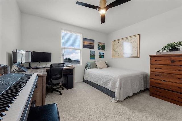 bedroom with ceiling fan and light colored carpet