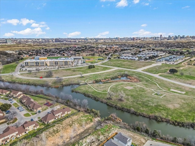 aerial view featuring a view of city and a water view