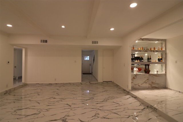 unfurnished room featuring marble finish floor, visible vents, beamed ceiling, and recessed lighting