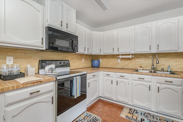 kitchen with white cabinetry, white range with electric stovetop, and black microwave