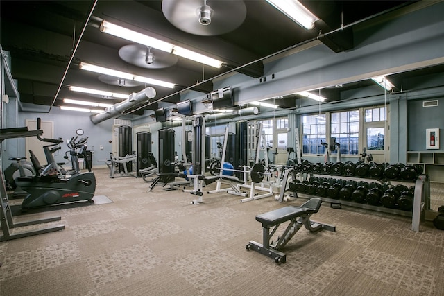 gym featuring visible vents