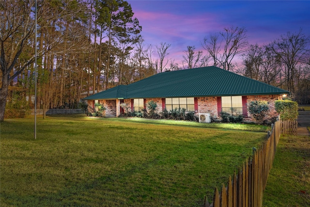 view of community featuring a lawn