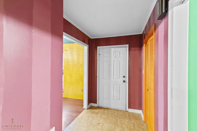 5651 Bretwood Dr, Keithville, LA 71047 - corridor featuring light wood-style floors, baseboards, and ornamental molding