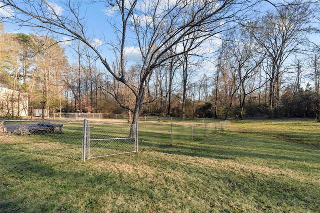 view of yard with a gate and fence