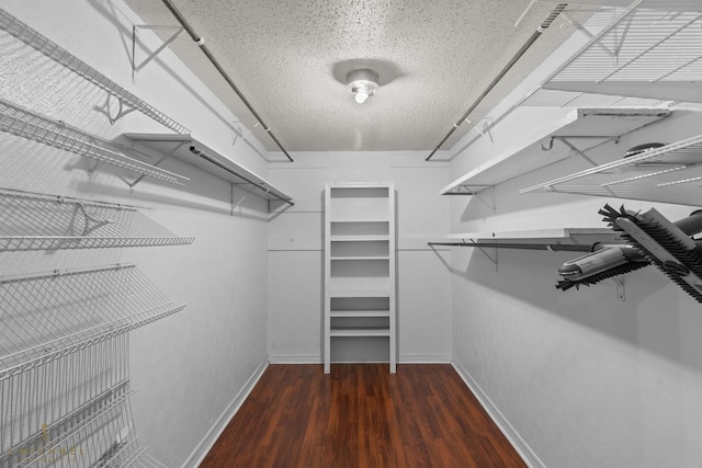 5651 Bretwood Dr, Keithville, LA 71047 - walk in closet with wood finished floors