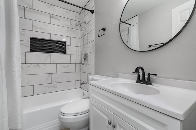 full bathroom featuring toilet, shower / tub combo with curtain, and vanity