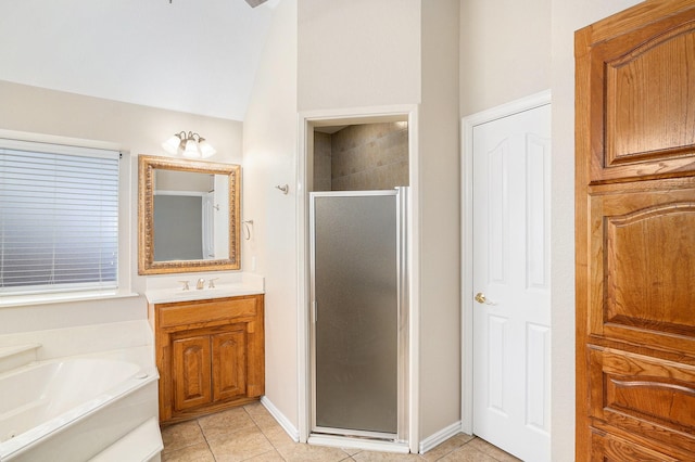 bathroom with tile patterned flooring, a shower stall, vanity, and a bath