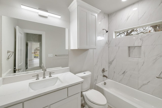 bathroom featuring vanity, toilet, and shower / bathtub combination