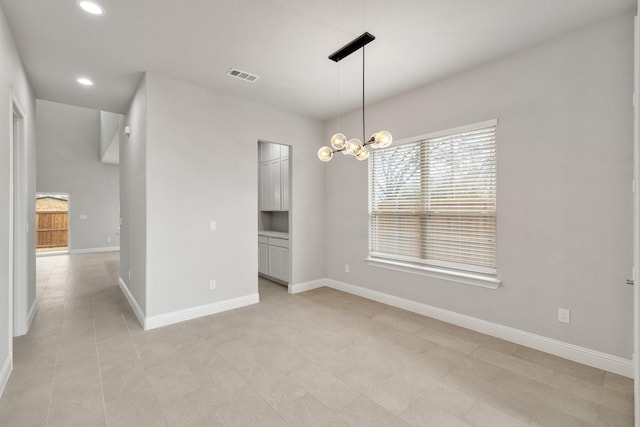 unfurnished dining area with baseboards, recessed lighting, visible vents, and a notable chandelier