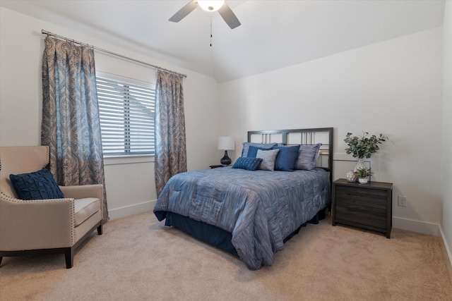 bedroom featuring light carpet, ceiling fan, lofted ceiling, and baseboards