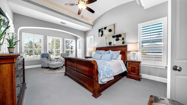 bedroom featuring carpet floors, visible vents, vaulted ceiling, and baseboards